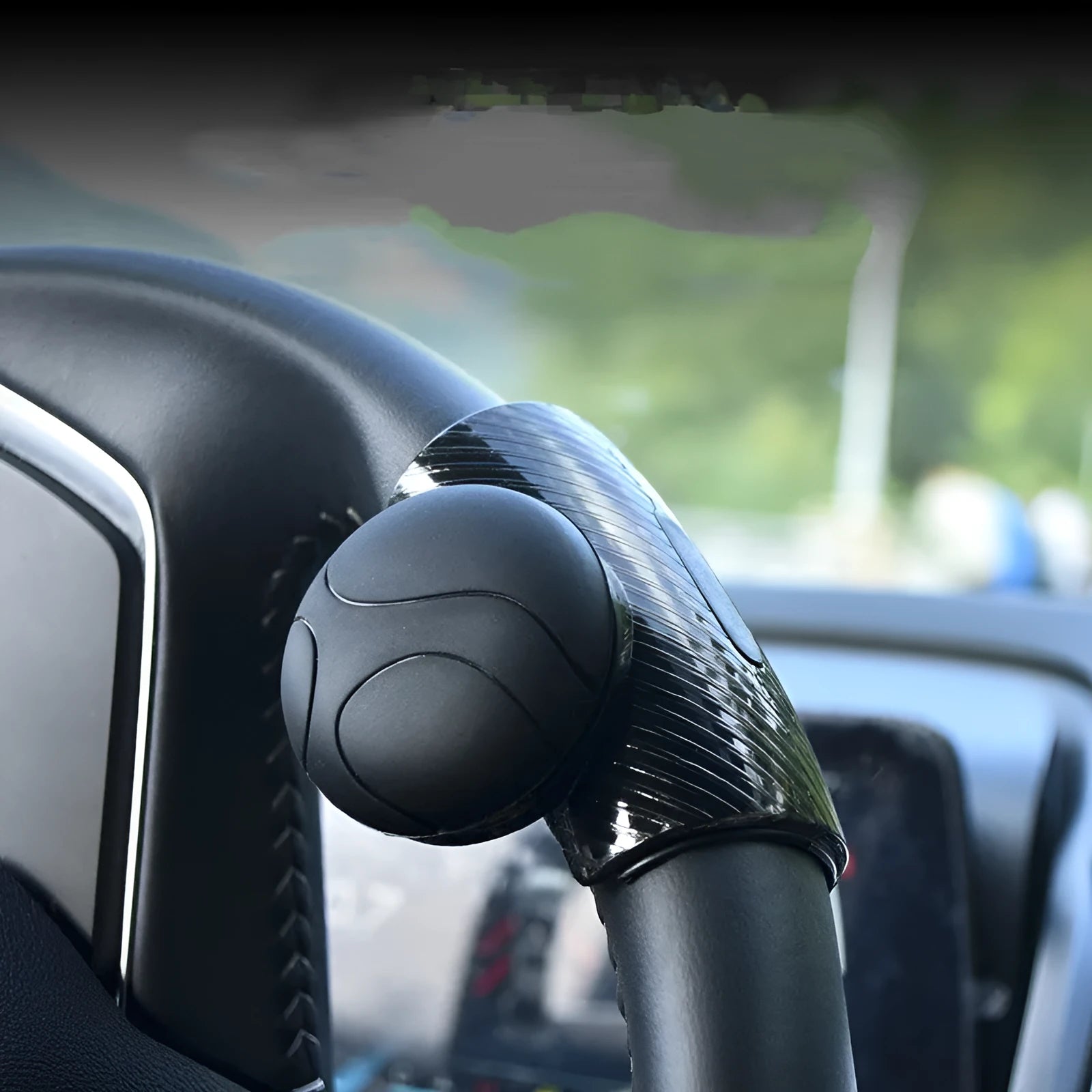 Black silicone steering wheel assist ball with metal bearing booster for single-hand driving
