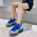 Women's leather casual sports shoe with a thick sole and cross-tie lacing in a choice of colours.