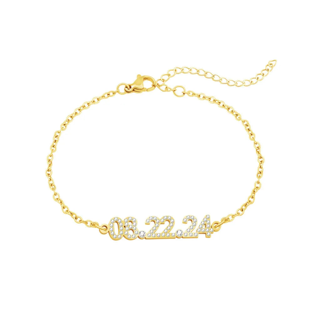 Stainless steel digital bracelet and necklace with diamonds on the numbers, shown in gold, rose gold and steel colour options.