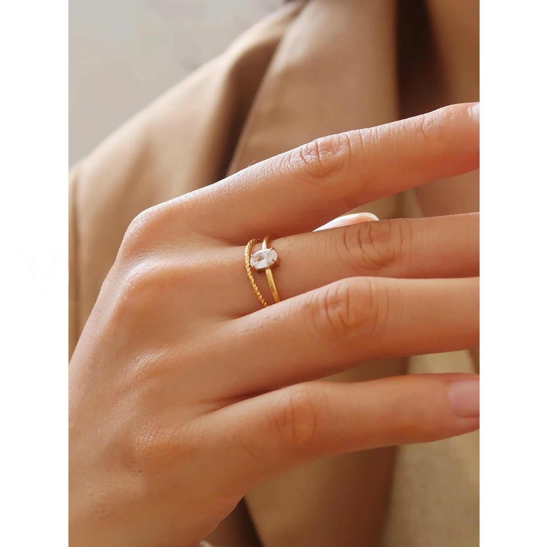 Golden love oval ring in stainless steel with electroplated finish showing heart design