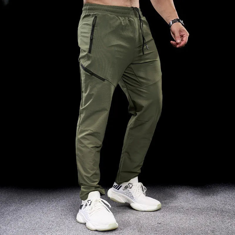 Men's waterproof quick-drying nylon workout pants in multiple colours for sports fitness