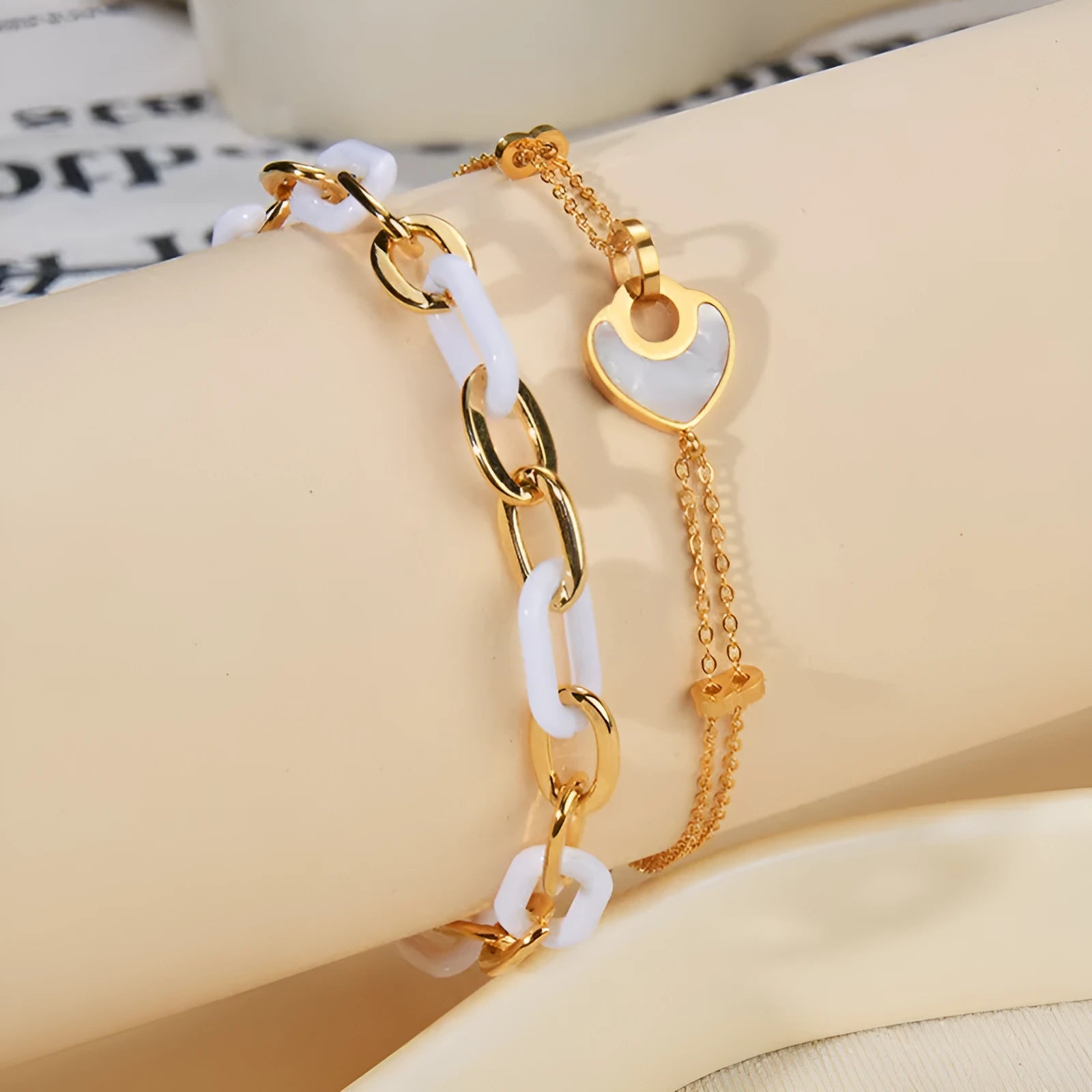 Stainless steel resin bracelet with a double-layer loving heart charm for women.