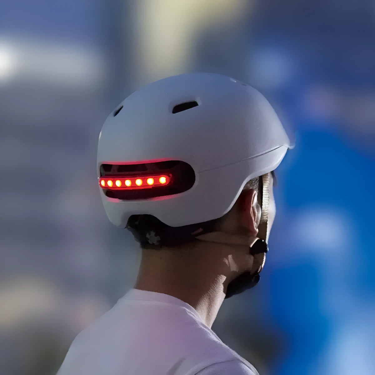 Urban Light Riding Intelligent Helmet in white on a background, side view showing EPS+PC shell construction