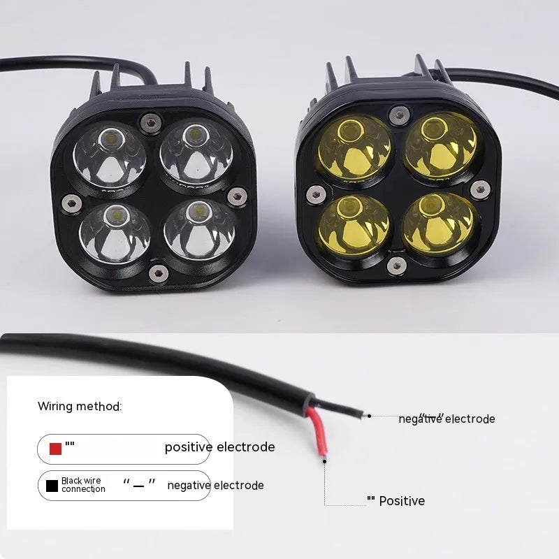 Four-eye clover spotlight headlight with aluminium base plate for vehicle modification.