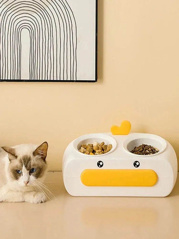 Duck design double pet bowl feeder tray in grey, pink, or yellow with plastic or stainless steel bowls for cats and small dogs.