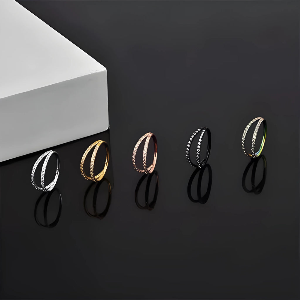 Titanium alloy nose ring with monoclinic diamond finish in gold and steel colour options showing precise measurements