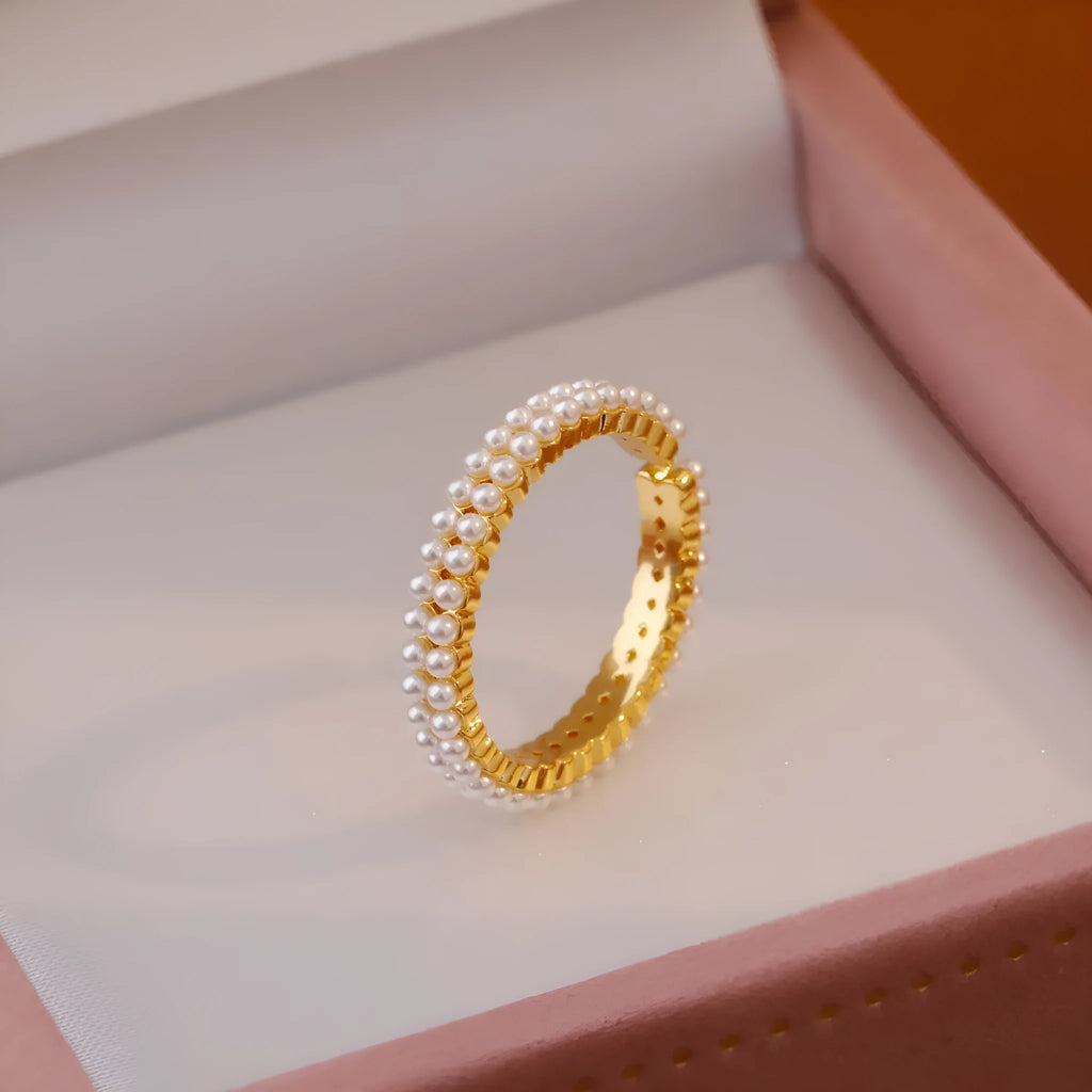 Gold geometric women's ring with a round pearl and open mouth adjustable design.