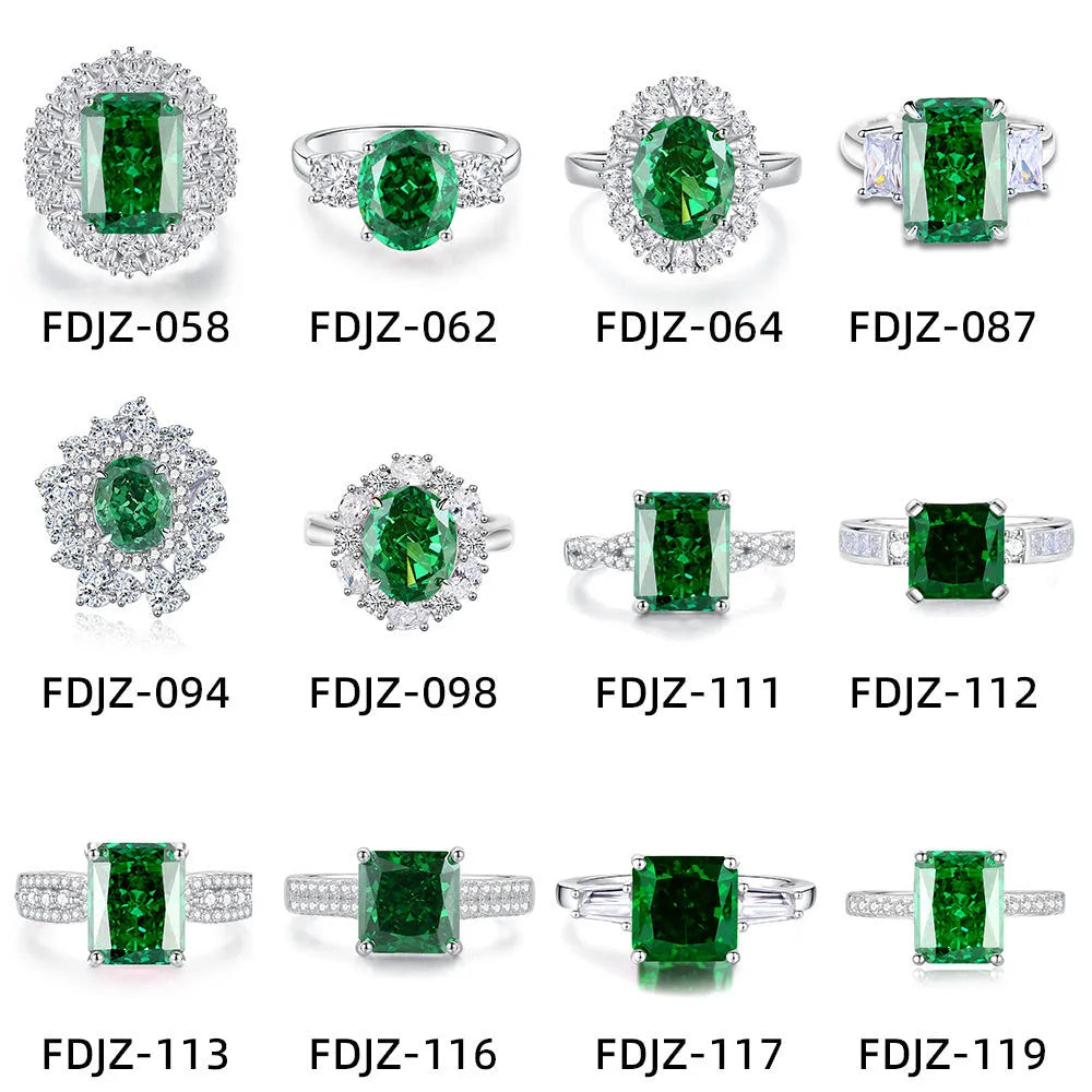 Women's sterling silver ring with a central emerald stone and diamond accent on a geometric band.