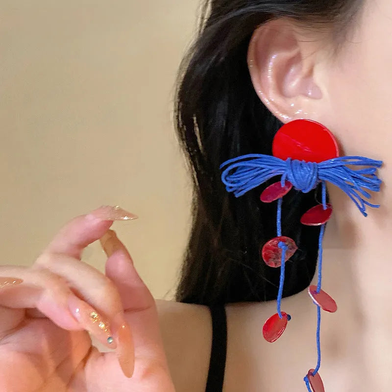 Women's geometric earrings with cloth construction and silver needle blue colour featuring round design elements
