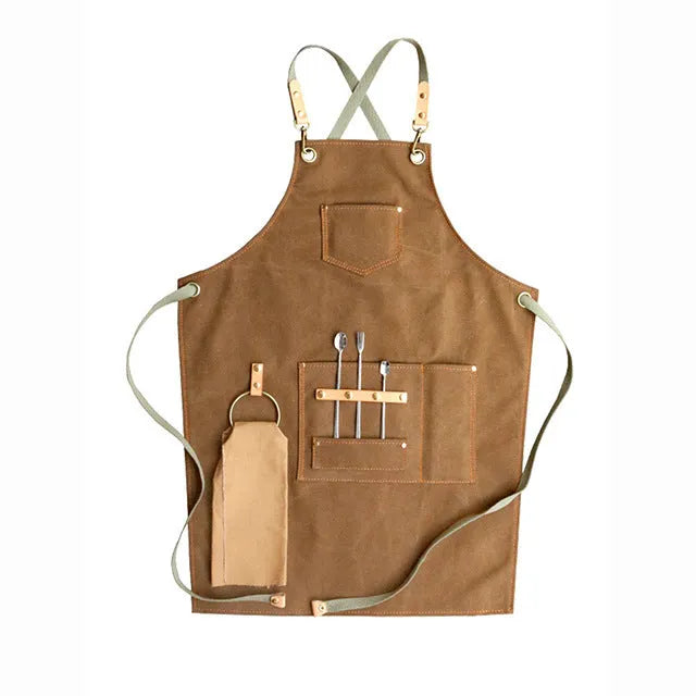 Canvas apron with cross back straps in camel colour for café or baking work