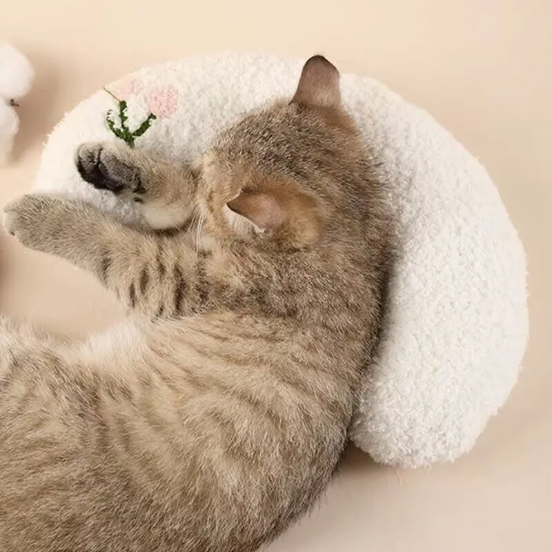 Blue U-shaped cat pillow showing neck support design for pet bedding