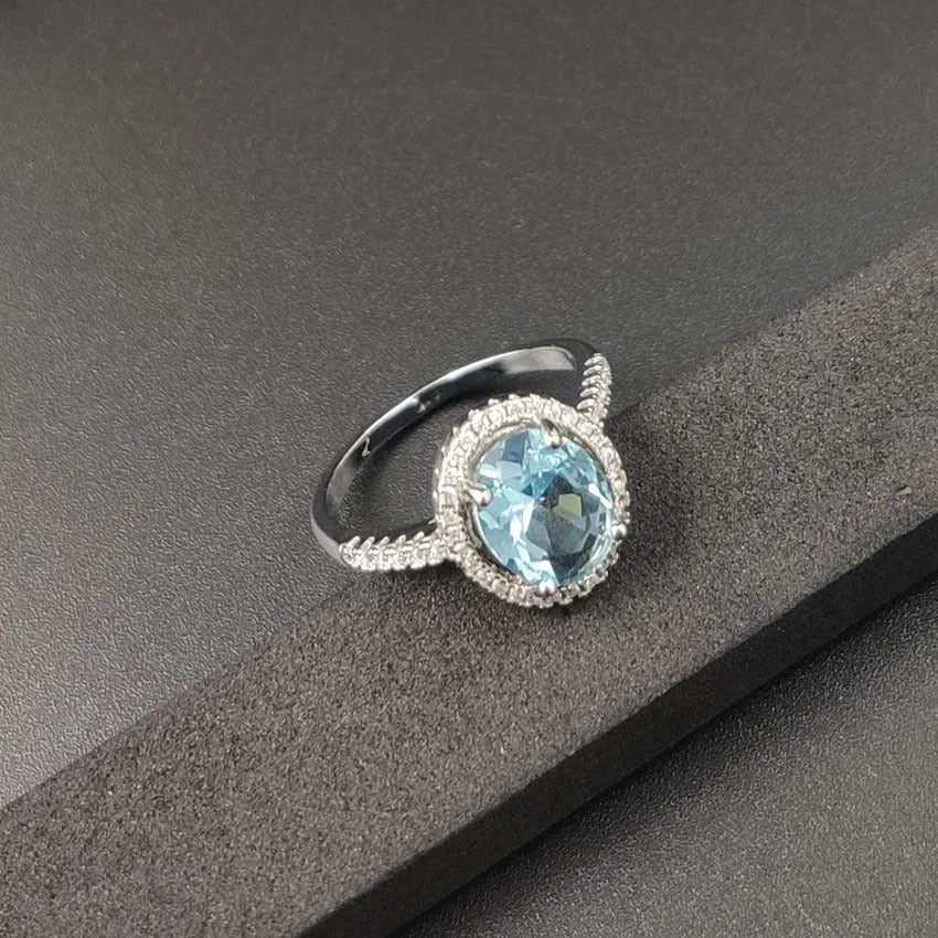 Round zircon ring with electroplated alloy band, available in multiple colours and sizes 6 to 10