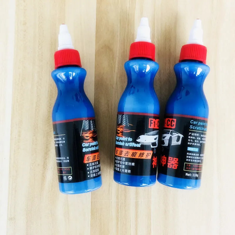 Small blue car scratch repair tool with applicator for automobile surface treatment