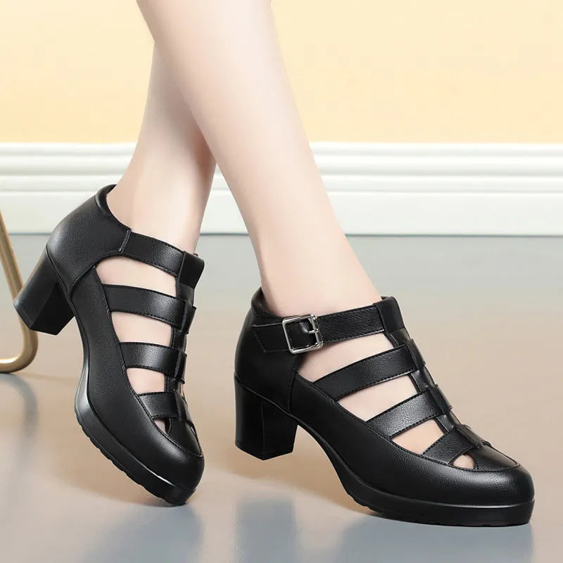 Women's beige closed toe sandals with a chunky heel, woven upper, and ankle strap buckle.