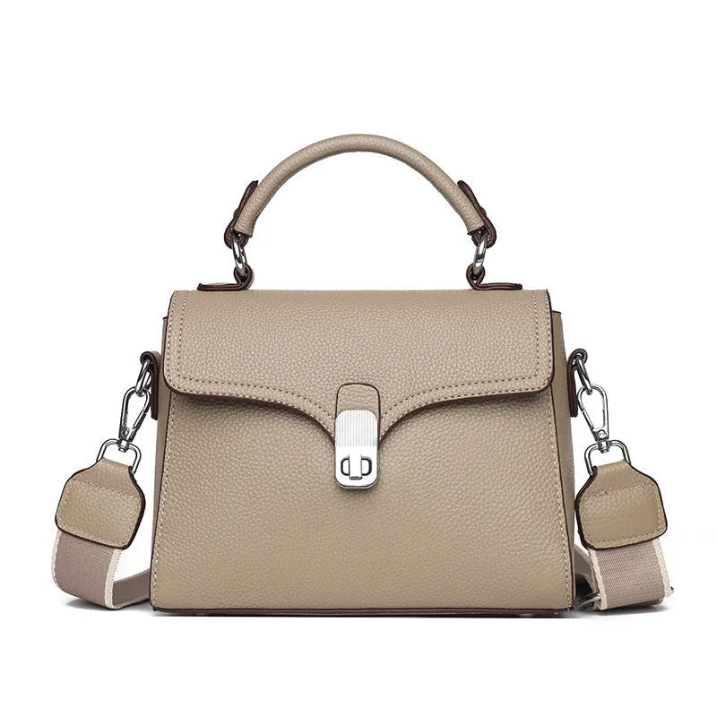 Korean commuter women's cross-body bag in genuine leather, oval shape, size 21x18x9cm, available in black
