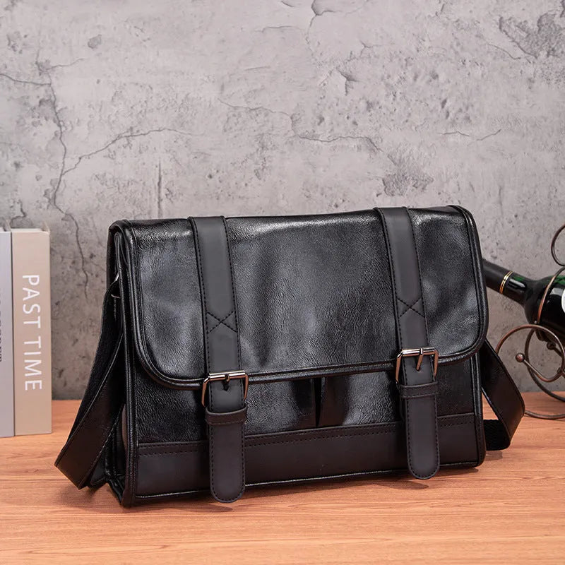 Black Korean-style men's commuter backpack with anti-theft function and PU material construction.