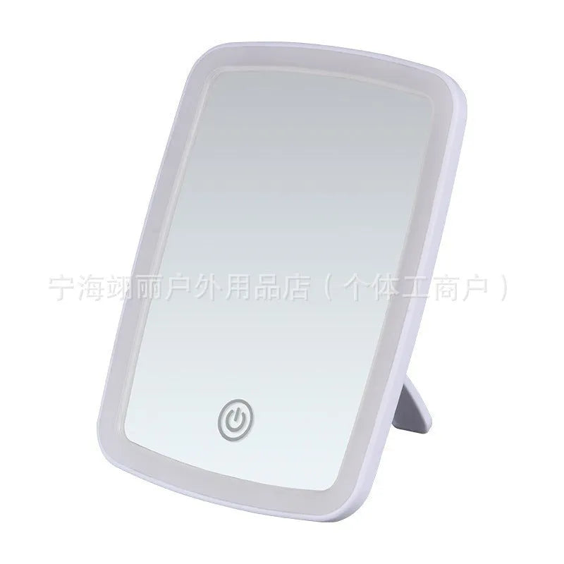 Simple desktop home LED makeup mirror with USB charging and ABS frame on a tabletop