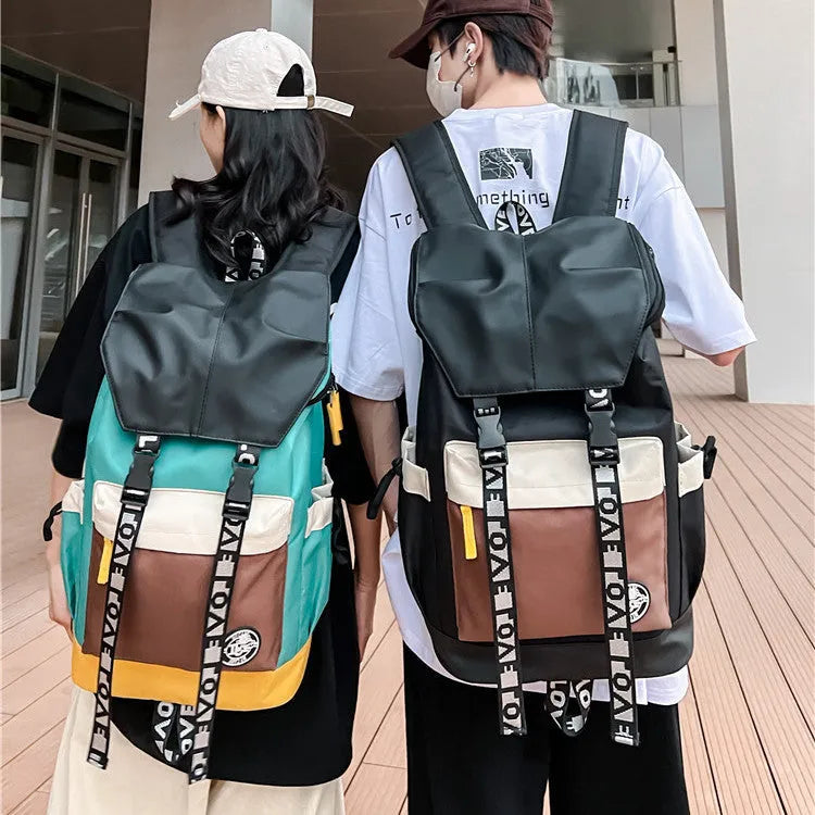 Oxford cloth backpack showing three carrying methods: handheld, shoulder, and backpack style