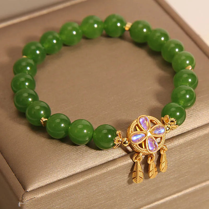 Original women's bracelet with a green jasper crystal four-leaf clover dream catcher pendant.