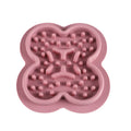 Silicone pet licking mat with textured surface for slow feeding, showing ridges and grooves