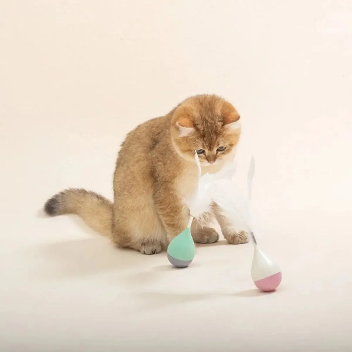Feather tumbler cat toy with goose feathers, ABS plastic construction and aluminium alloy core