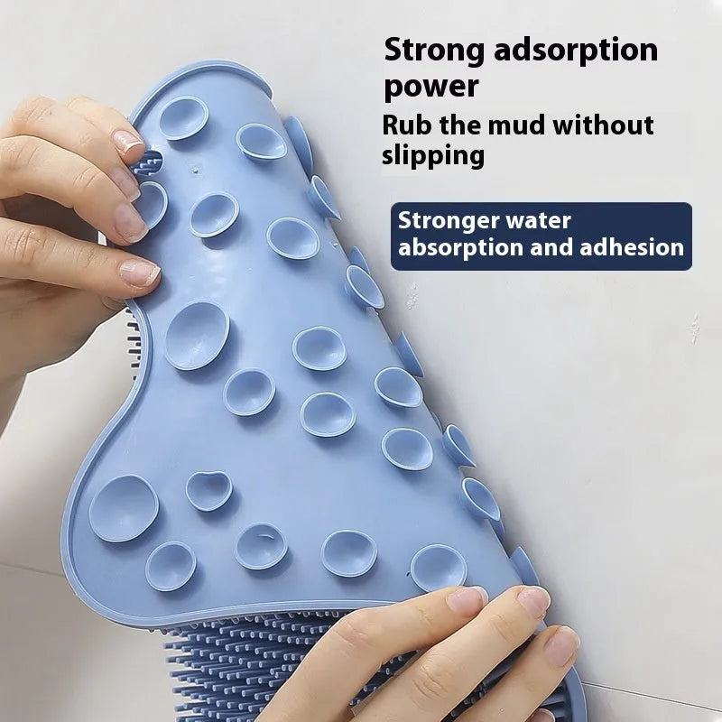 Blue silicone bath rub cushion massage mat for back scrubbing, shown with soft bristles.