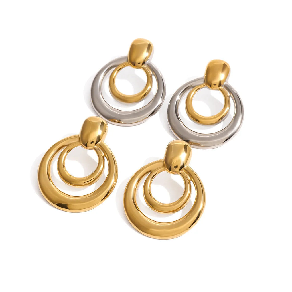 Golden electroplated titanium steel hollow geometric stud earrings showing double layer round design