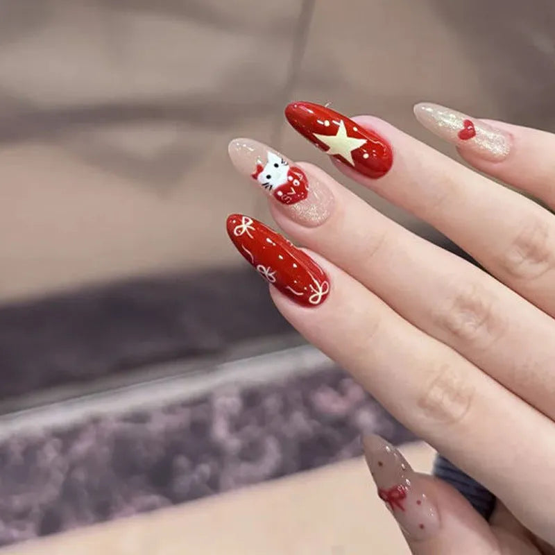 Pack of sweet girl style fake nails showing random colour designs in a set of ten.
