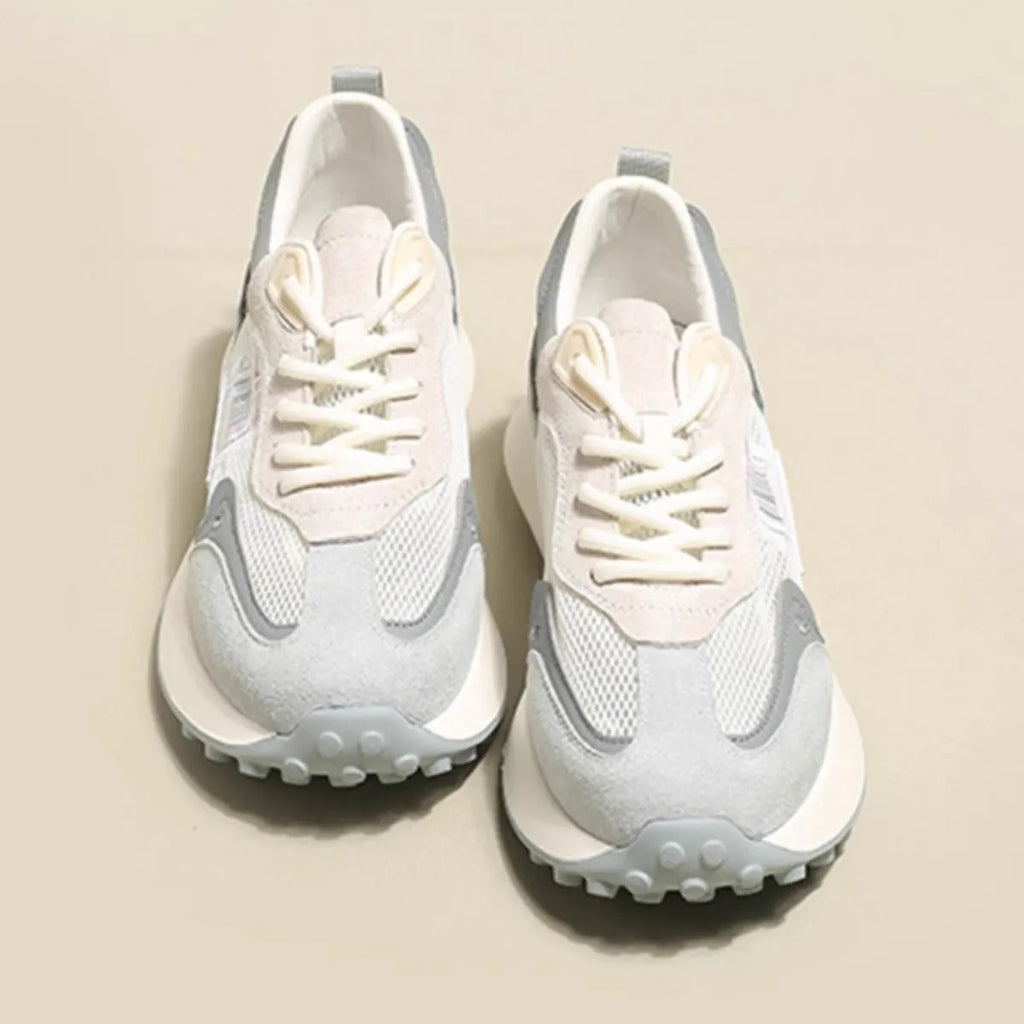 Women's grey and pink low-top retro sneakers with mesh lining and rubber sole