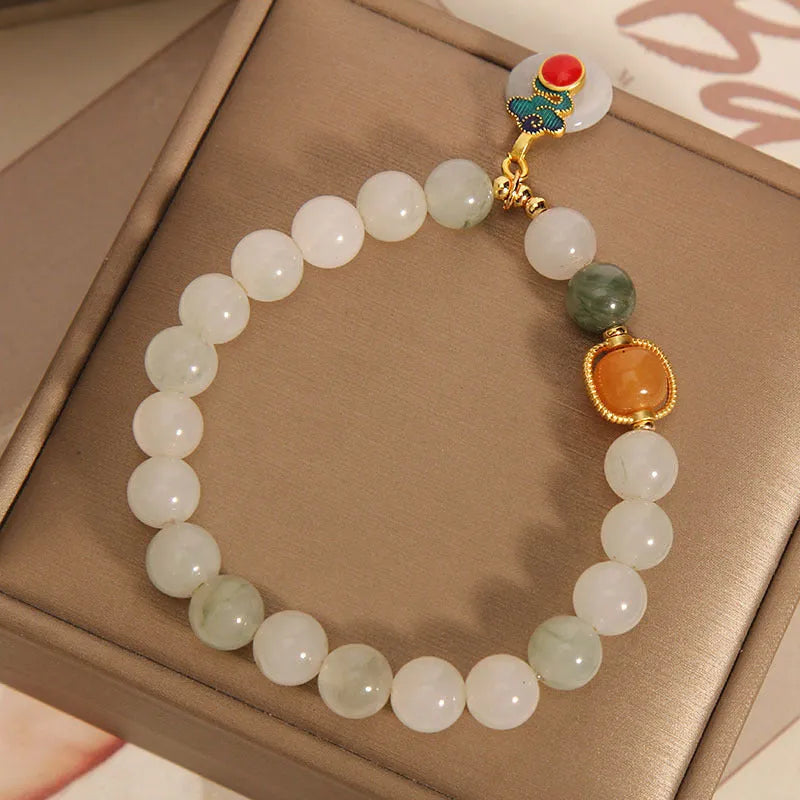 Translucent green ice jade bracelet with Xiangyun peace buckle and pearl decorative elements