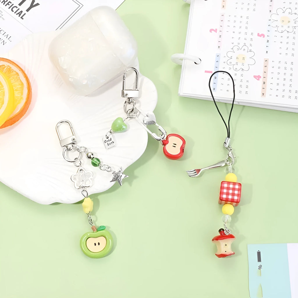 Fruit-themed mobile phone bag pendant keychain with resin apple and strawberry designs