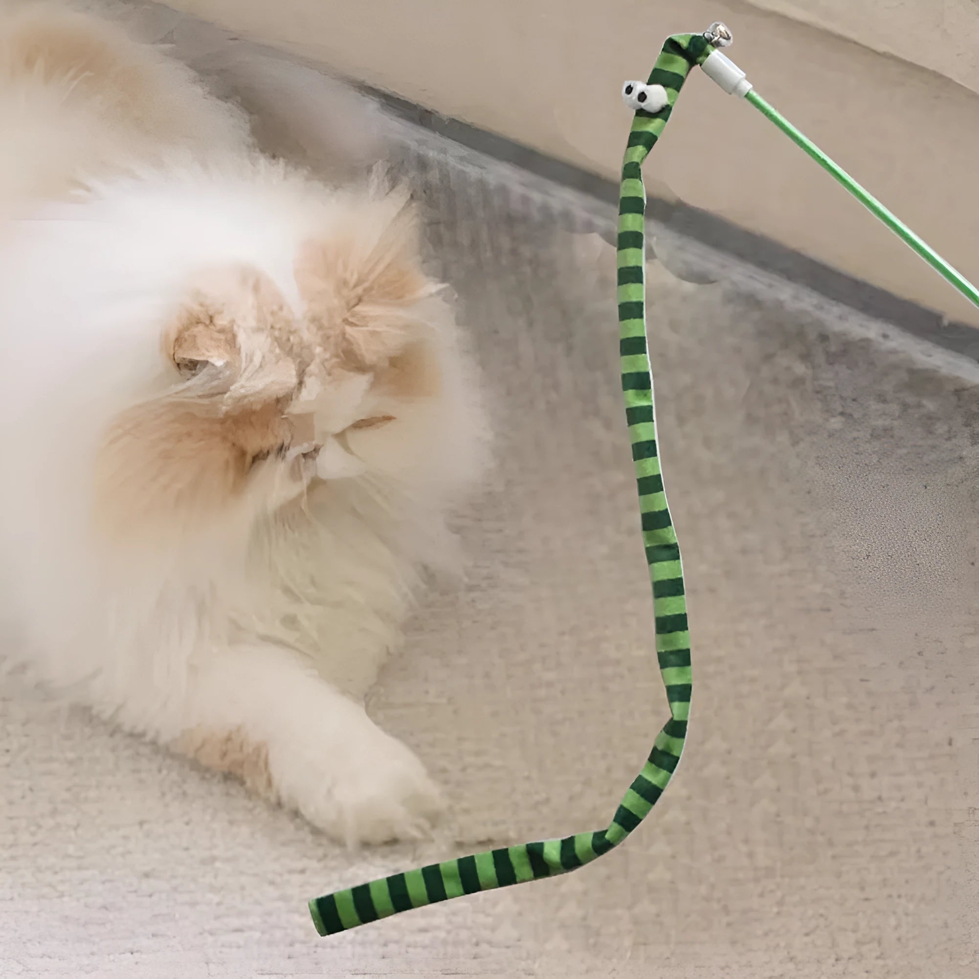 Cat wand toy with polycarbonate handle and colourful plush strip for interactive play