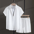 Men's loose fit cotton blend beach suit with short sleeve shirt and shorts in black.