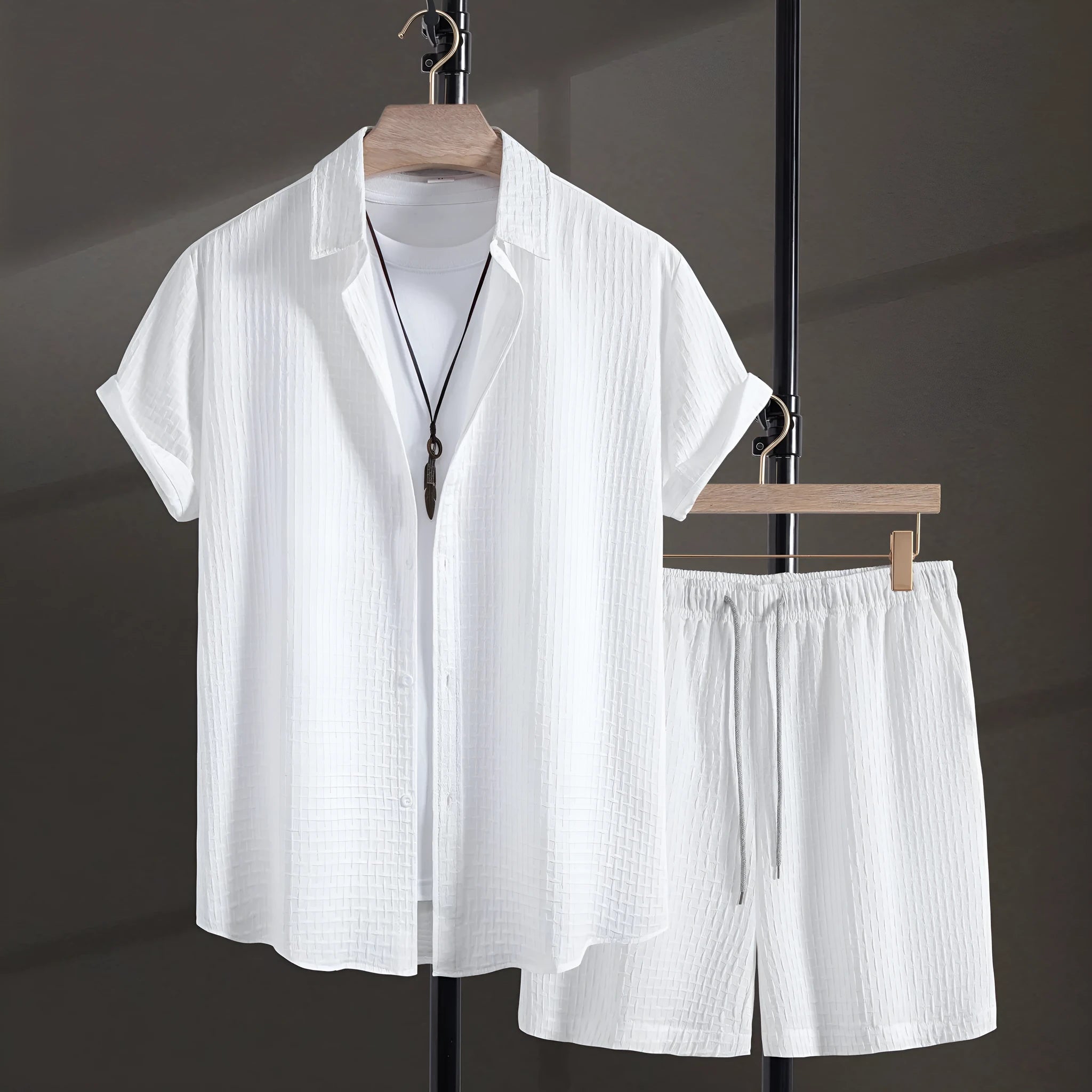 Men's loose fit cotton blend beach suit with short sleeve shirt and shorts in black.