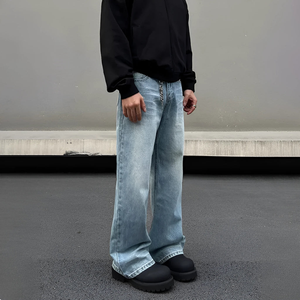 Men's blue straight jeans with whisker wash details and flared leg style