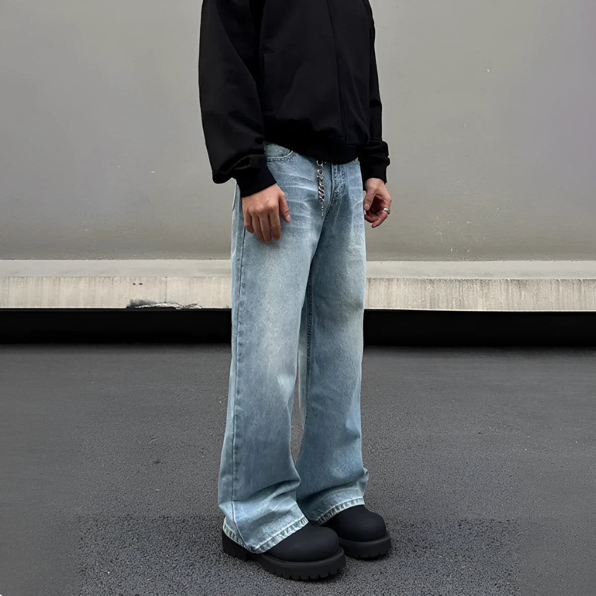 Men's blue straight jeans with whisker wash details and flared leg style