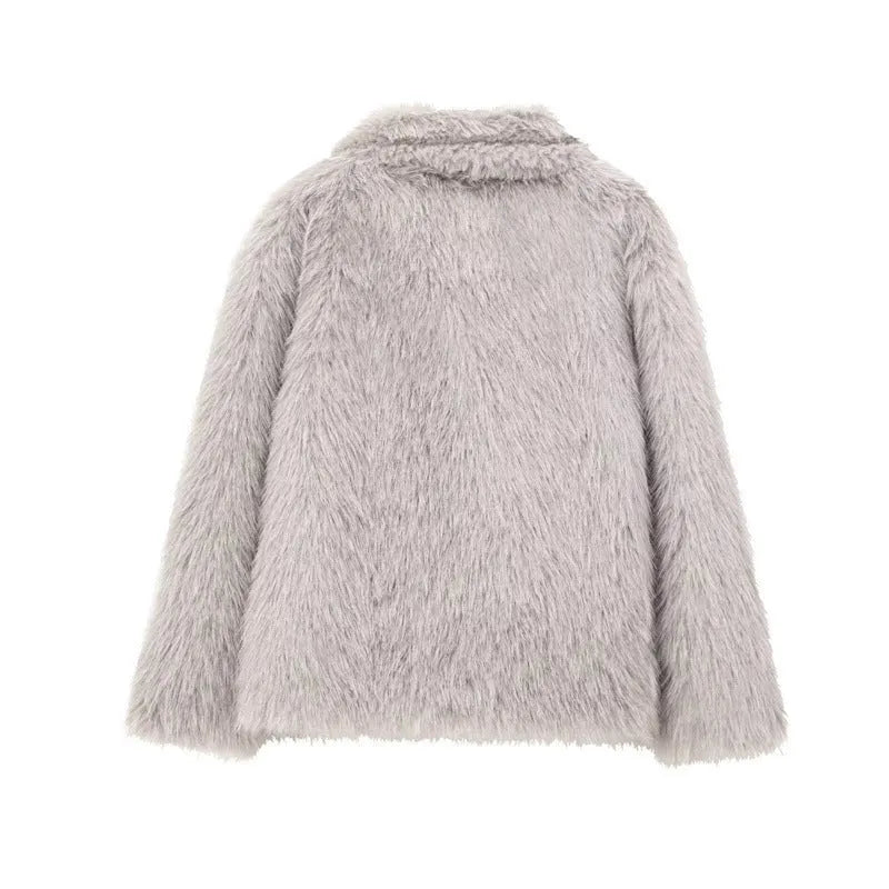 Women's white faux fur jacket with lapel collar and long sleeves shown on mannequin