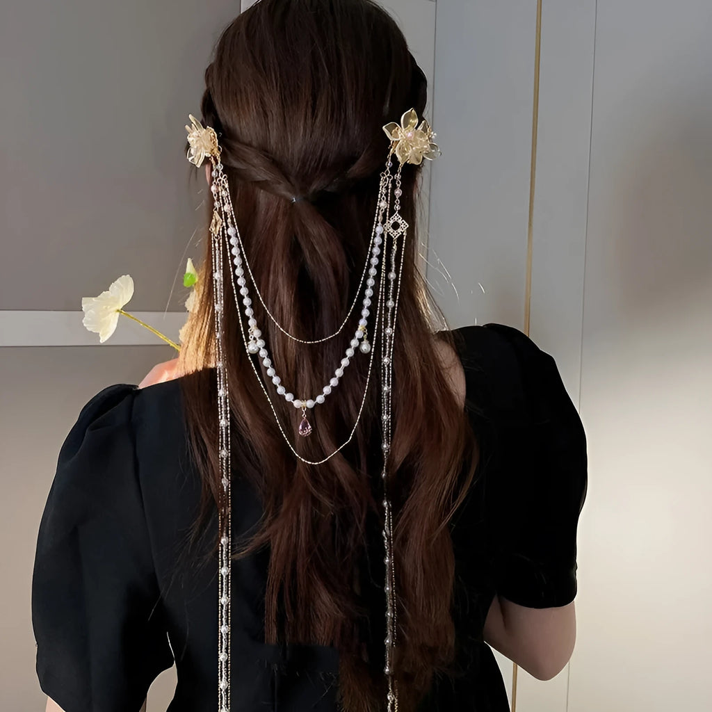 Gold-colour acrylic hairpin with pearl and diamond elements and long tassel design
