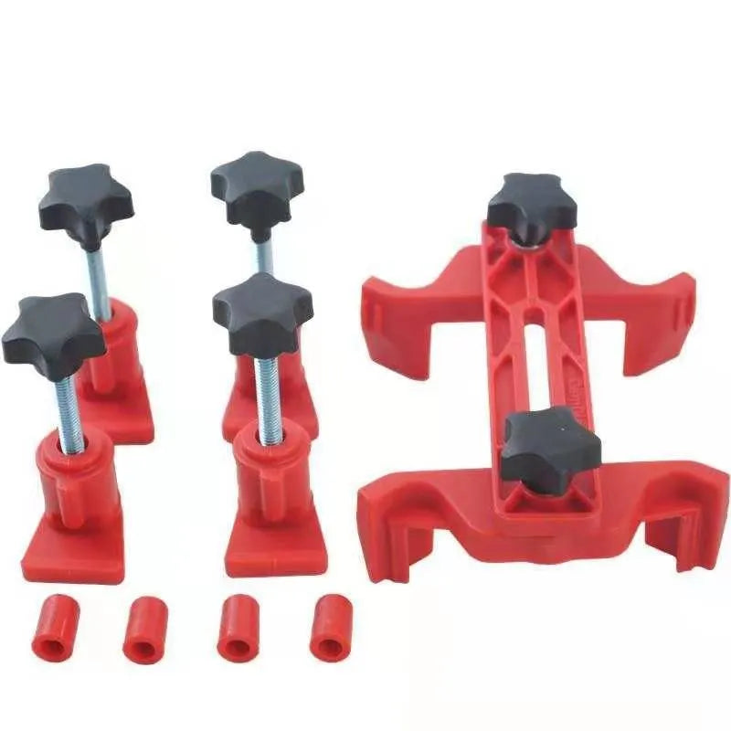 Red motorcycle support lift table raising a bike 16 inches above the ground for repair work