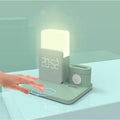Dark green 3-in-1 wireless charging stand holding a mobile phone and a smartwatch on its integrated mounts.