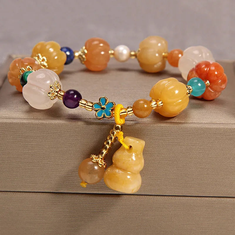 Yellow agate crystal bracelet with gold silk thread and adjustable sliding knot closure