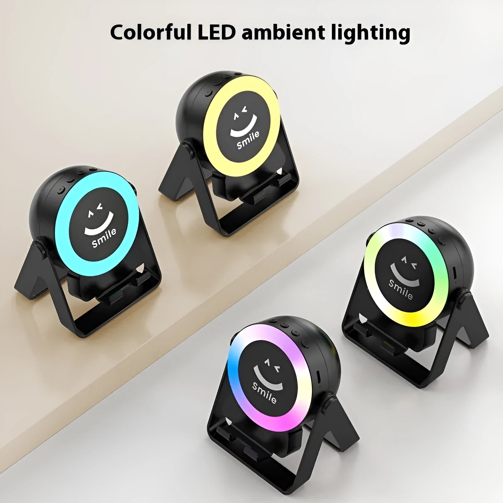 Black and white Bluetooth speaker with LED lighting on induction charging bracket