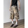 Yellow snake pattern camouflage jeans with cropped leg length on cotton denim