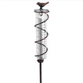Cast iron hummingbird-shaped base holding glass rain measurement tube with 0-800ml scale
