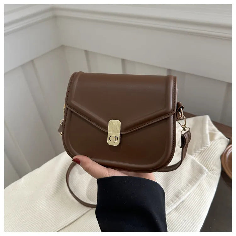 Soft PU leather messenger bag with clamshell opening in horizontal square shape