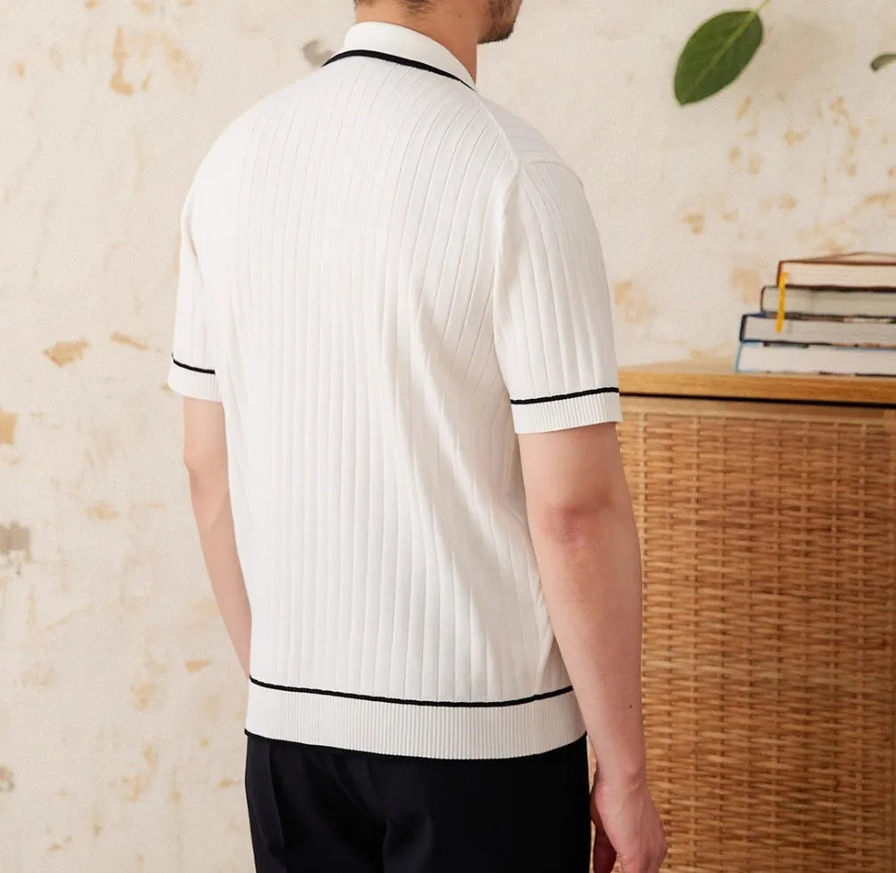 Slim black elastic lapel polo shirt with short sleeves on a hanger.