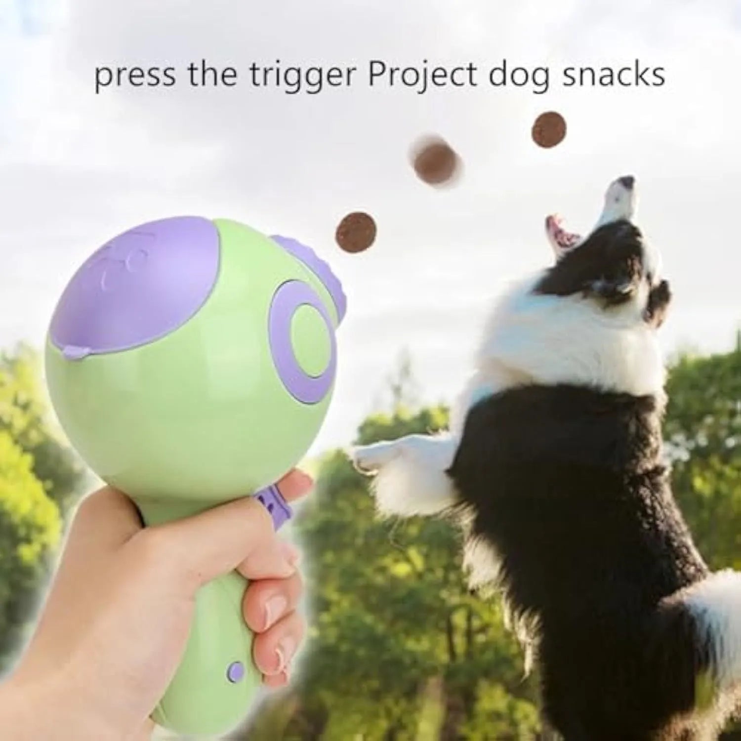 Green, orange, and pink interactive dog treat launcher toy measuring 15.5cm by 9cm by 8.5cm