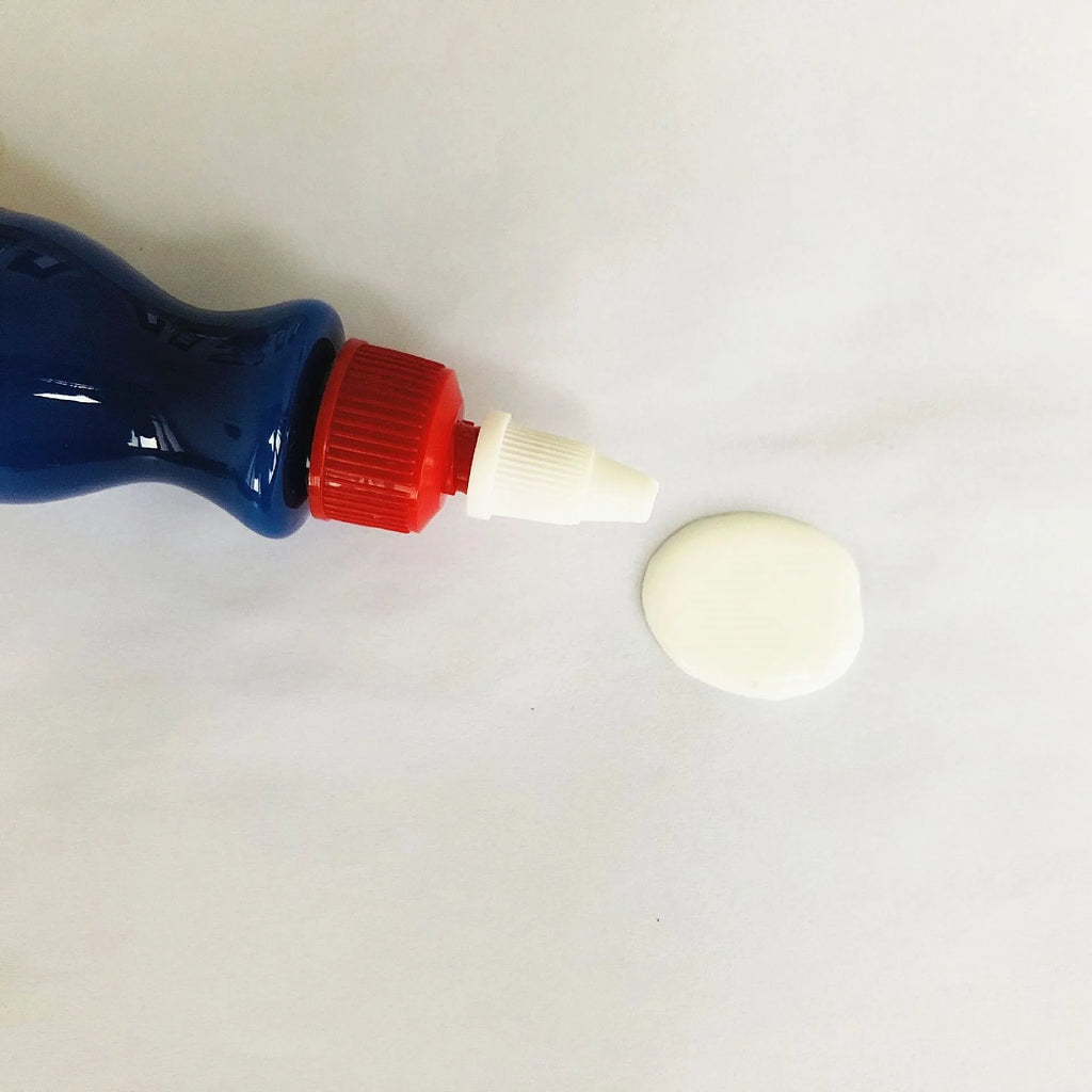 Small blue car scratch repair tool with applicator for automobile surface treatment