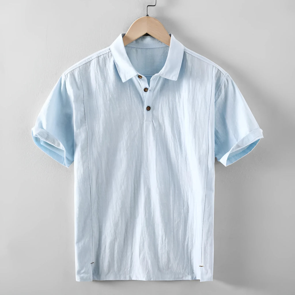 Men's loose-fit cotton linen casual shirt in a solid colour, shown on a hanger.