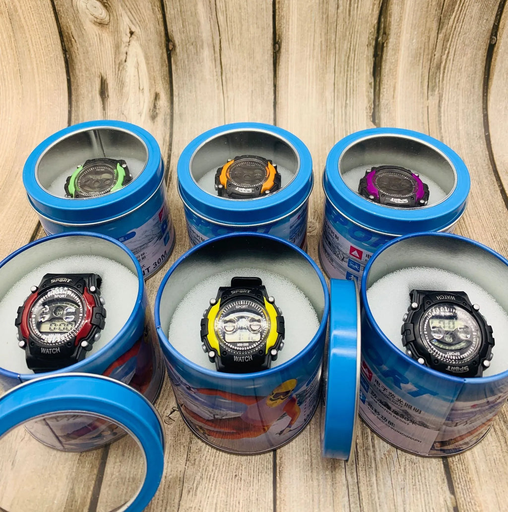 Children's digital sports watch with silicone strap, plastic case, and mixed colour display showing alarm and calendar functions